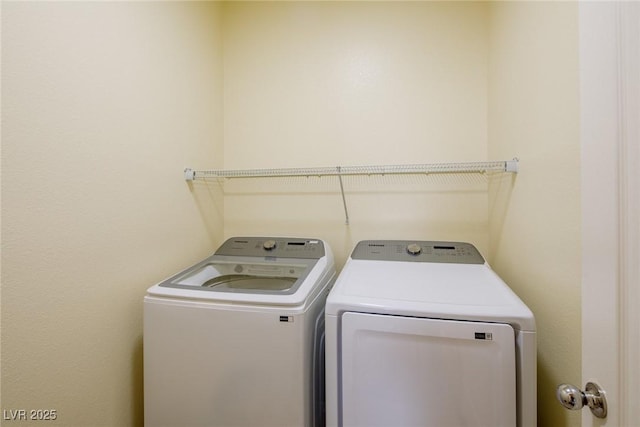 7611 Redcloud Peak St, Las Vegas, NV 89166 - washroom featuring washing machine and clothes dryer