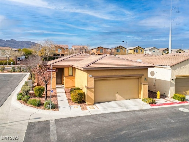 7611 Redcloud Peak St, Las Vegas, NV 89166 - view of front of property featuring stucco siding, a garage, and a residential view