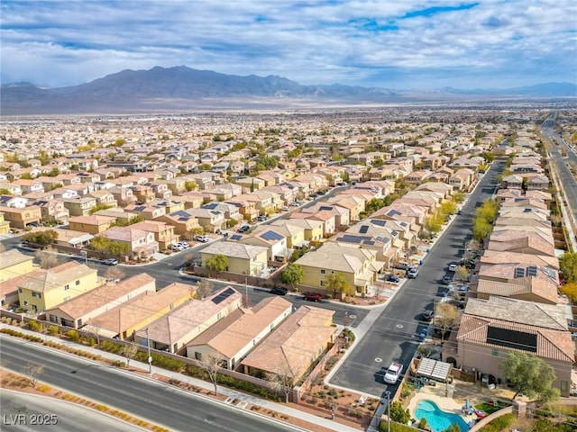 7611 Redcloud Peak St, Las Vegas, NV 89166 - aerial view of residential area featuring a mountain backdrop and a pool area