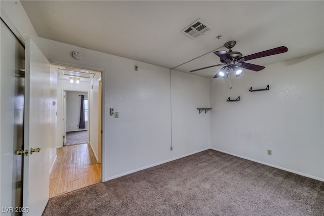 2040 Mesquite Ln Unit 203, Laughlin, NV 89029 - spare room featuring carpet floors, attic access, ceiling fan, baseboards, and a pendent fire sprinkler