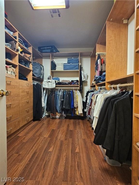 7104 Carrondale Way, Las Vegas, NV 89128 - spacious closet featuring wood finished floors