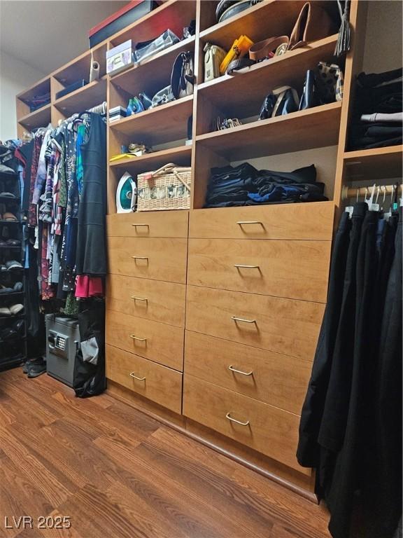 7104 Carrondale Way, Las Vegas, NV 89128 - spacious closet featuring wood finished floors