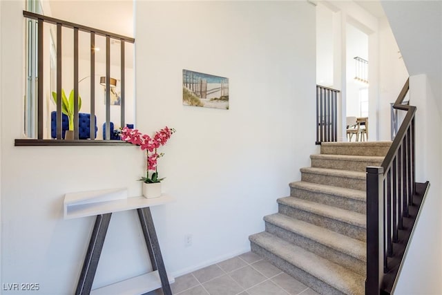 7499 Lodano Ave, Las Vegas, NV 89113 - stairway with tile patterned flooring and baseboards