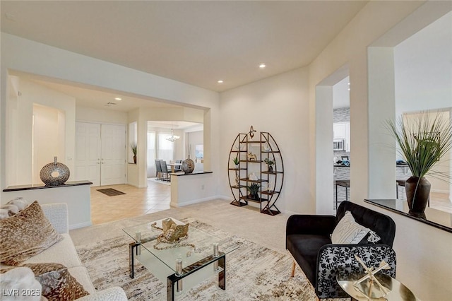 4845 Santo Romeo St, Las Vegas, NV 89135 - living room featuring light colored carpet, plenty of natural light, recessed lighting, and baseboards