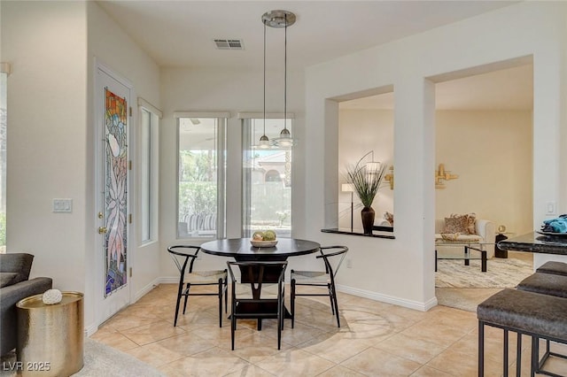 4845 Santo Romeo St, Las Vegas, NV 89135 - dining room with light tile patterned floors and baseboards