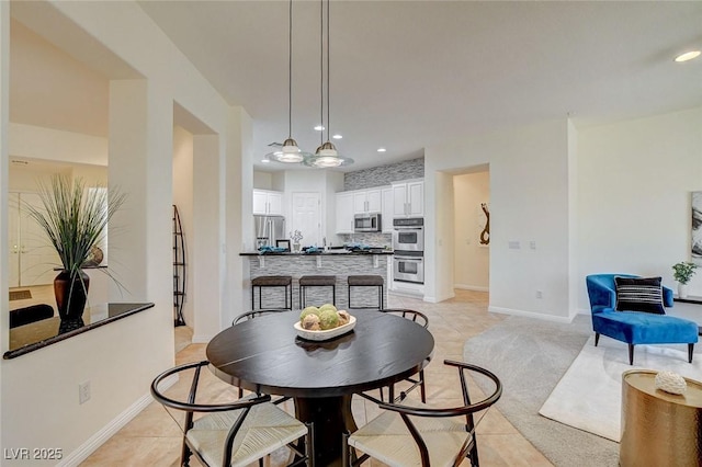 4845 Santo Romeo St, Las Vegas, NV 89135 - dining space with light tile patterned floors, recessed lighting, and baseboards