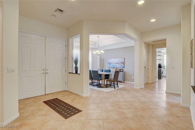 4845 Santo Romeo St, Las Vegas, NV 89135 - foyer featuring a chandelier, light tile patterned floors, recessed lighting, baseboards, and a raised ceiling