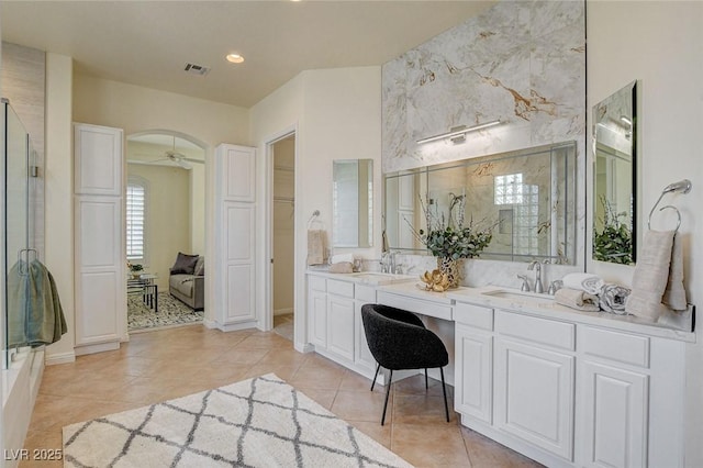 4845 Santo Romeo St, Las Vegas, NV 89135 - bathroom featuring tile patterned flooring, a shower stall, double vanity, baseboards, and recessed lighting