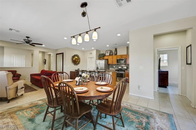 703 Shiva St, Las Vegas, NV 89178 - dining space featuring recessed lighting, ceiling fan, light tile patterned floors, and baseboards