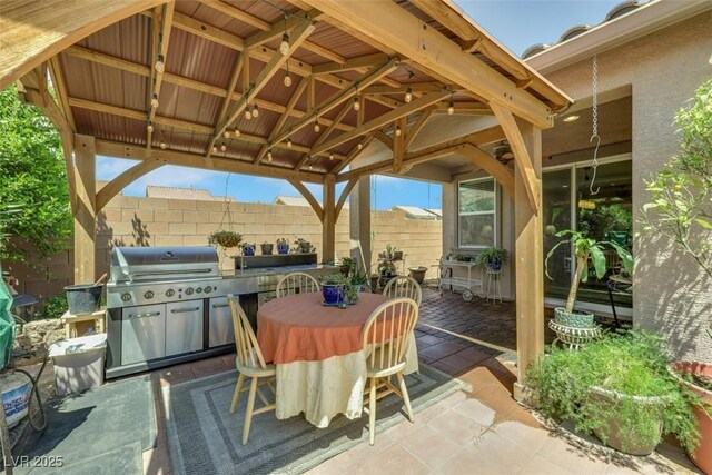 703 Shiva St, Las Vegas, NV 89178 - view of patio / terrace featuring outdoor dining space, a gazebo, and area for grilling