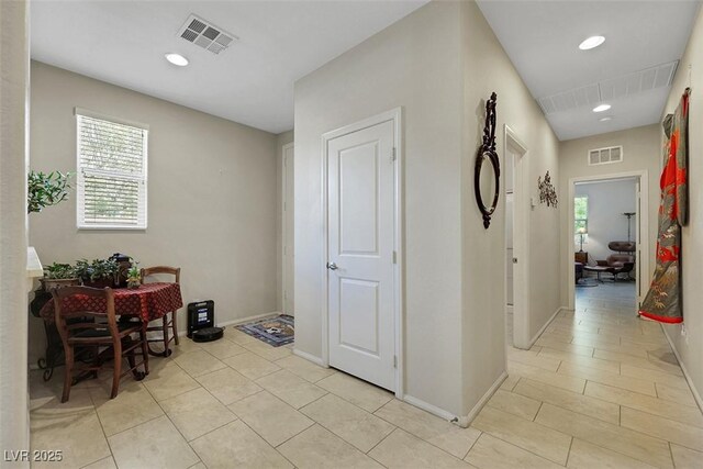 703 Shiva St, Las Vegas, NV 89178 - corridor with light tile patterned floors, baseboards, and recessed lighting