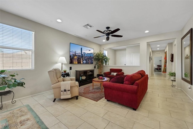 703 Shiva St, Las Vegas, NV 89178 - living area featuring recessed lighting, ceiling fan, light tile patterned floors, and baseboards