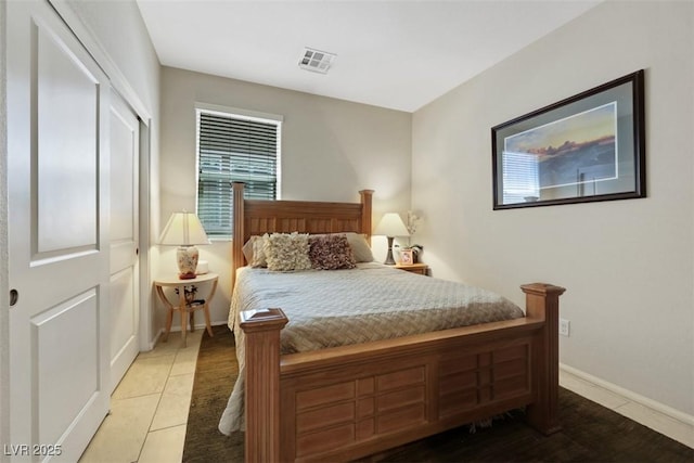 703 Shiva St, Las Vegas, NV 89178 - tiled bedroom with baseboards and multiple windows
