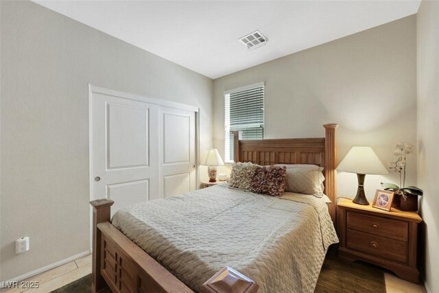 703 Shiva St, Las Vegas, NV 89178 - bedroom featuring baseboards and a closet