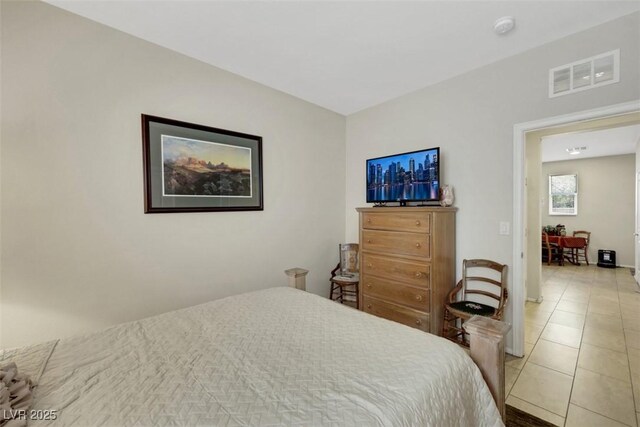 703 Shiva St, Las Vegas, NV 89178 - bedroom with light tile patterned floors