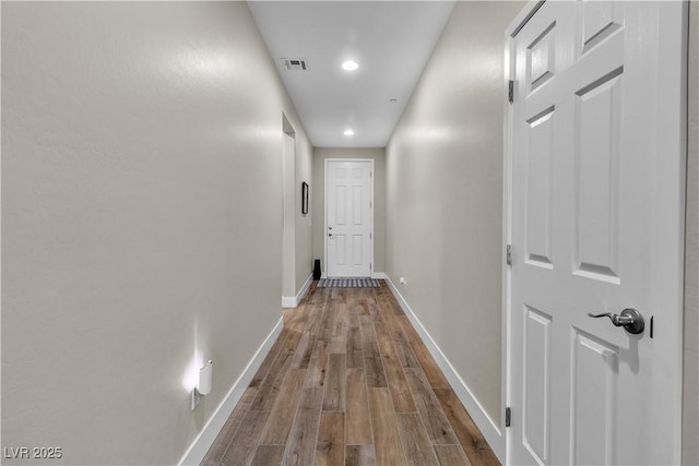 741 Monroe Hill Pl, Henderson, NV 89011 - corridor featuring recessed lighting, dark wood-style flooring, and baseboards
