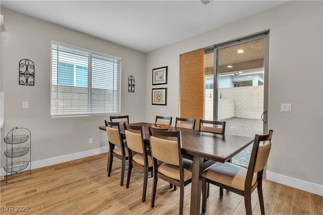 741 Monroe Hill Pl, Henderson, NV 89011 - dining area featuring light wood-style floors and baseboards