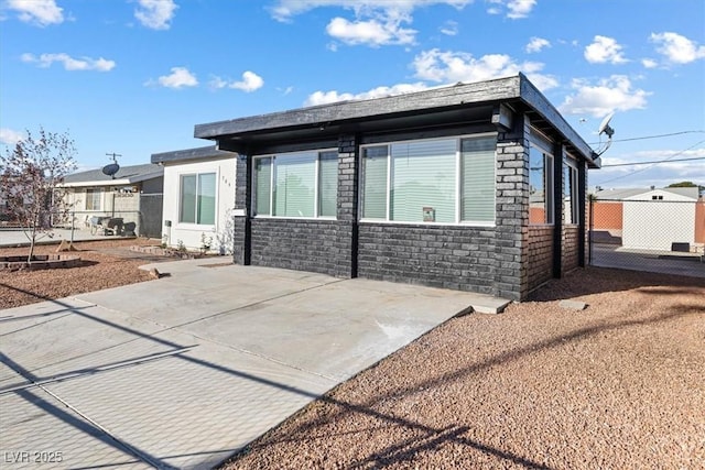 704 Slayton Dr, Las Vegas, NV 89107 - view of front of home featuring a patio