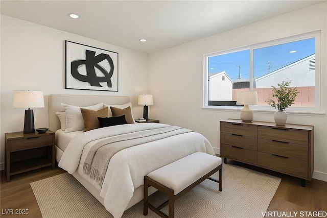 704 Slayton Dr, Las Vegas, NV 89107 - bedroom with wood finished floors, baseboards, and recessed lighting