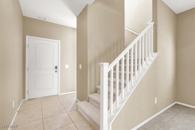 7931 Mineral Peak St, Las Vegas, NV 89166 - tiled foyer entrance featuring baseboards