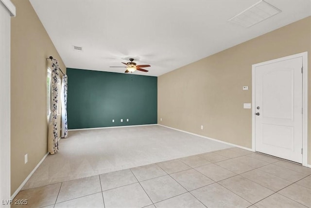 7931 Mineral Peak St, Las Vegas, NV 89166 - carpeted spare room featuring a ceiling fan, baseboards, and tile patterned floors
