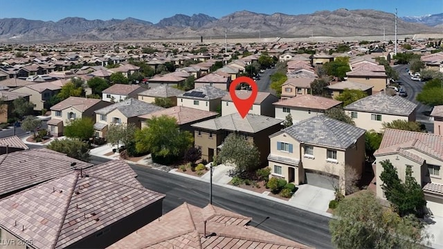 7931 Mineral Peak St, Las Vegas, NV 89166 - aerial view of residential area with a mountain backdrop