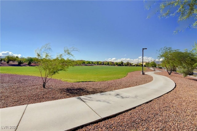 7931 Mineral Peak St, Las Vegas, NV 89166 - view of property's community featuring a yard