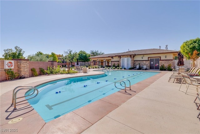 7931 Mineral Peak St, Las Vegas, NV 89166 - community pool featuring a patio