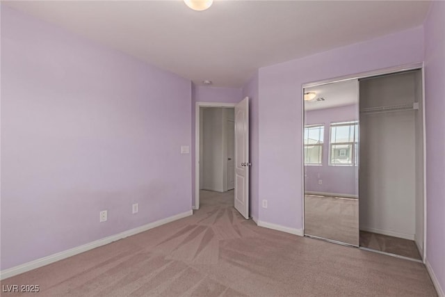 104 Big Cliff Ave, North Las Vegas, NV 89031 - unfurnished bedroom with carpet floors, a closet, and baseboards