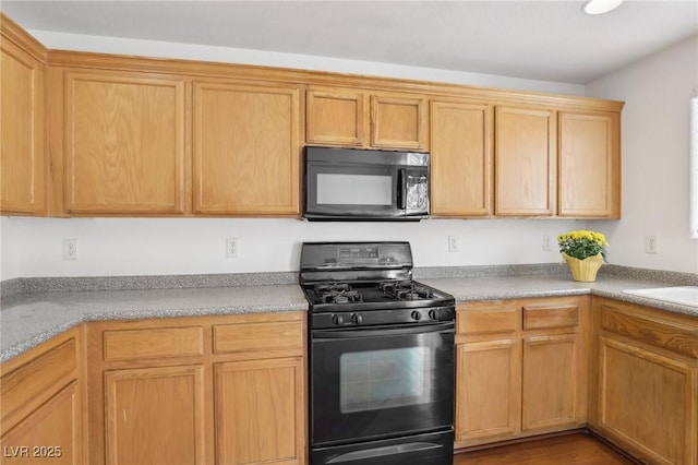 1043 Monte De Oro Ave, Las Vegas, NV 89183 - kitchen featuring black appliances, light countertops, and a sink