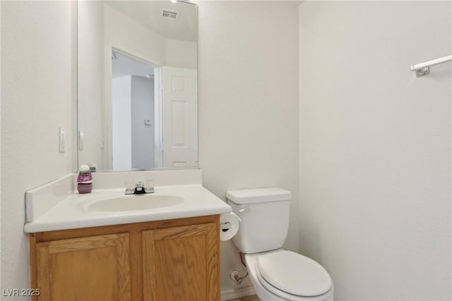 1043 Monte De Oro Ave, Las Vegas, NV 89183 - half bathroom featuring vanity and toilet