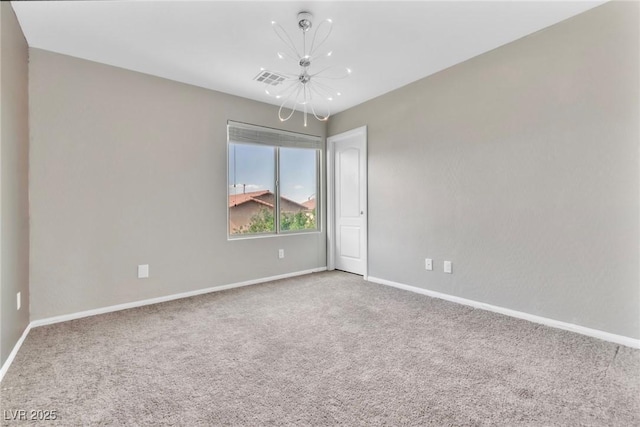 7624 Mallard Bay Ave, Las Vegas, NV 89179 - carpeted empty room featuring a chandelier and baseboards