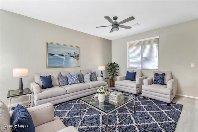 7624 Mallard Bay Ave, Las Vegas, NV 89179 - living room featuring wood finished floors, ceiling fan, and baseboards