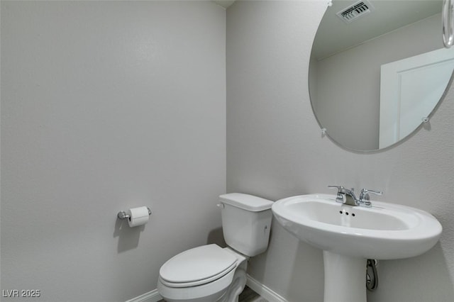 3270 Palindrome Ave, Henderson, NV 89044 - bathroom featuring toilet and baseboards