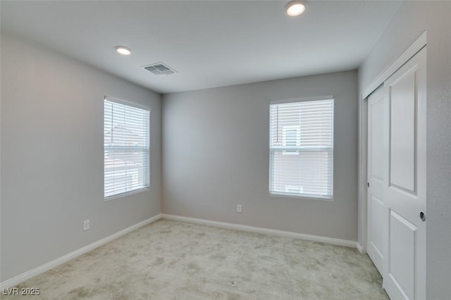 3270 Palindrome Ave, Henderson, NV 89044 - unfurnished bedroom featuring light colored carpet, baseboards, a closet, and recessed lighting