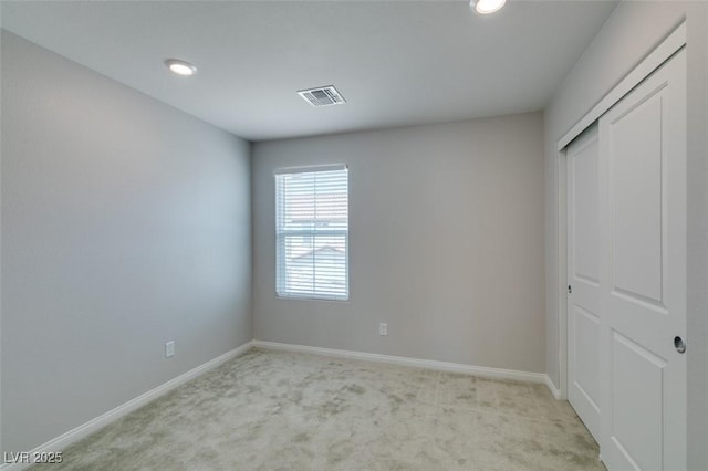 3270 Palindrome Ave, Henderson, NV 89044 - unfurnished bedroom featuring light colored carpet, baseboards, recessed lighting, and a closet