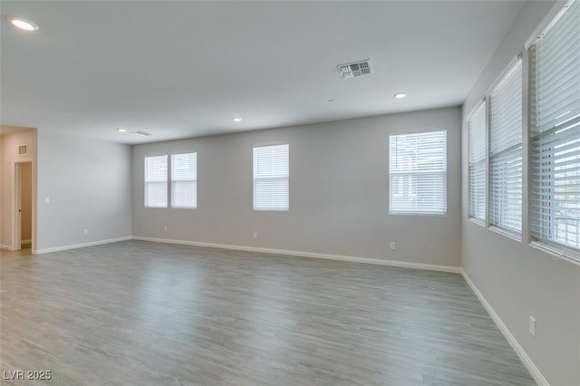 3270 Palindrome Ave, Henderson, NV 89044 - unfurnished room featuring light wood-style floors, baseboards, and recessed lighting