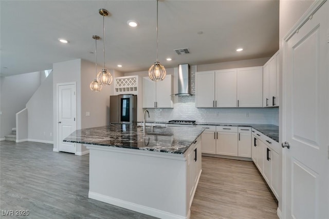 3270 Palindrome Ave, Henderson, NV 89044 - kitchen featuring smart refrigerator, a sink, wall chimney exhaust hood, backsplash, and light wood-style floors
