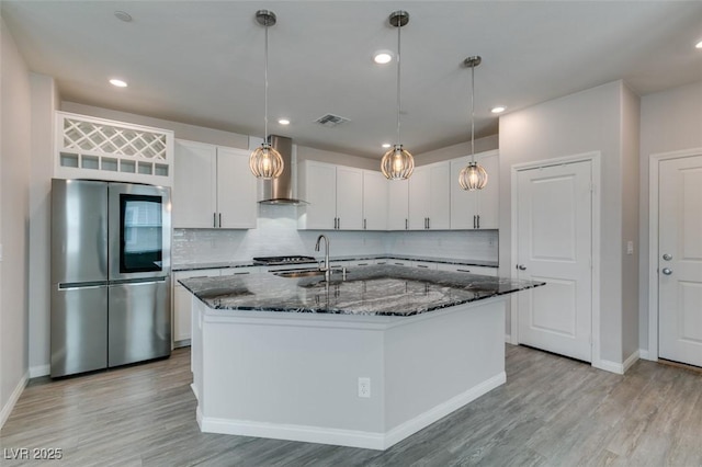 3270 Palindrome Ave, Henderson, NV 89044 - kitchen featuring smart refrigerator, wall chimney exhaust hood, a sink, light wood-style flooring, and dark stone counters