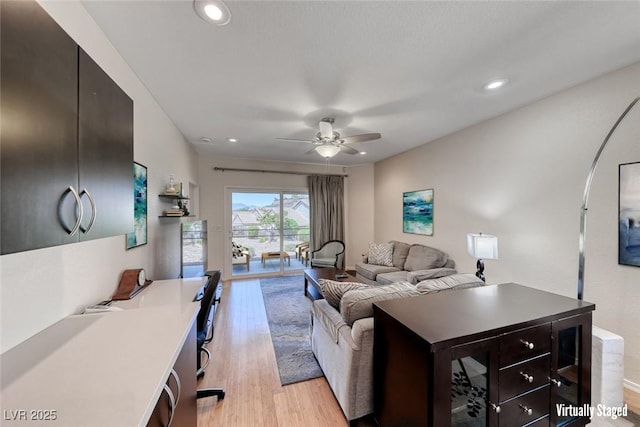 2501 Celestial Light Dr, Henderson, NV 89044 - living room featuring light wood finished floors, a ceiling fan, and recessed lighting