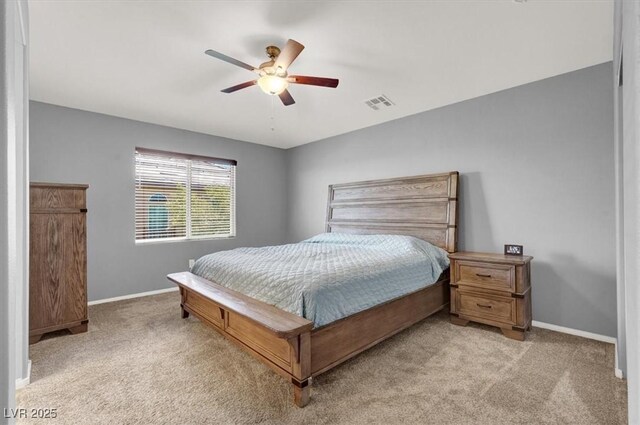 10845 Drake Ridge Ave, Las Vegas, NV 89166 - bedroom featuring light colored carpet, baseboards, and ceiling fan