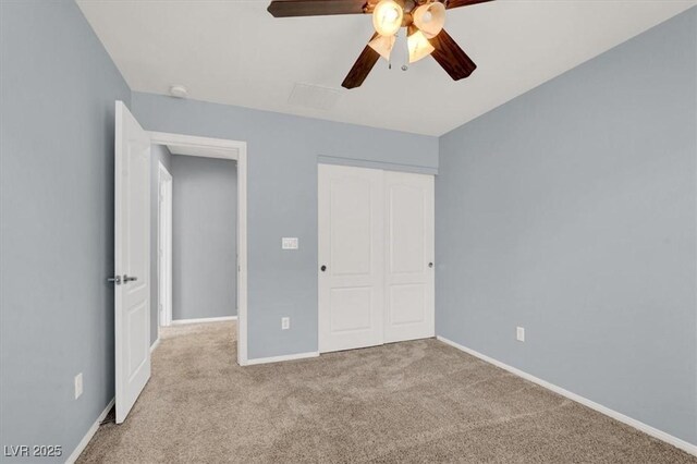 10845 Drake Ridge Ave, Las Vegas, NV 89166 - unfurnished bedroom with carpet floors, a closet, and baseboards