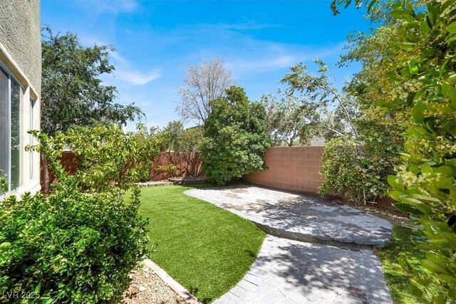 10845 Drake Ridge Ave, Las Vegas, NV 89166 - view of yard featuring a patio
