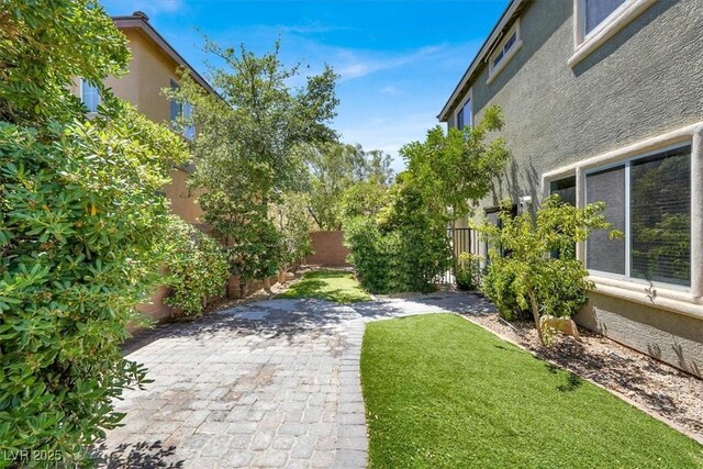10845 Drake Ridge Ave, Las Vegas, NV 89166 - view of yard featuring a patio area