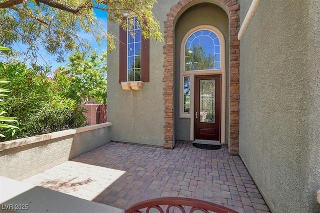 10845 Drake Ridge Ave, Las Vegas, NV 89166 - entrance to property featuring stucco siding and a patio area