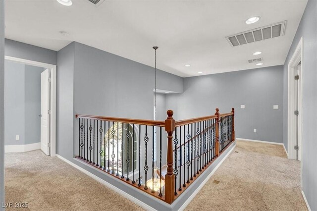 10845 Drake Ridge Ave, Las Vegas, NV 89166 - hall featuring carpet flooring, baseboards, recessed lighting, and an upstairs landing
