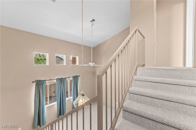 5615 Calais Ct, Las Vegas, NV 89118 - stairs featuring carpet floors and ceiling fan
