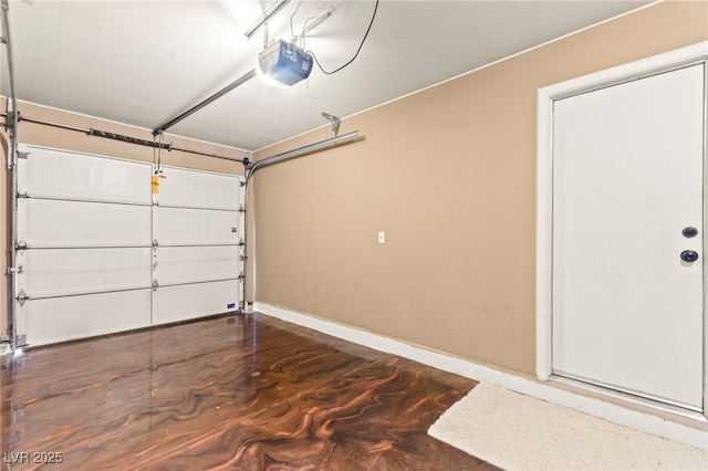 5615 Calais Ct, Las Vegas, NV 89118 - garage with a garage door opener and baseboards