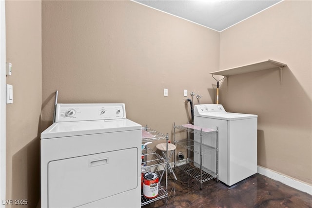 5615 Calais Ct, Las Vegas, NV 89118 - laundry area with baseboards and separate washer and dryer