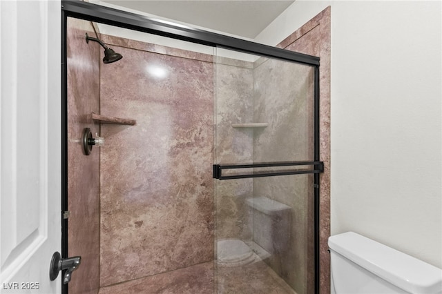 5615 Calais Ct, Las Vegas, NV 89118 - bathroom featuring a shower stall and toilet